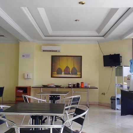 Quint Hotel Manado Buitenkant foto