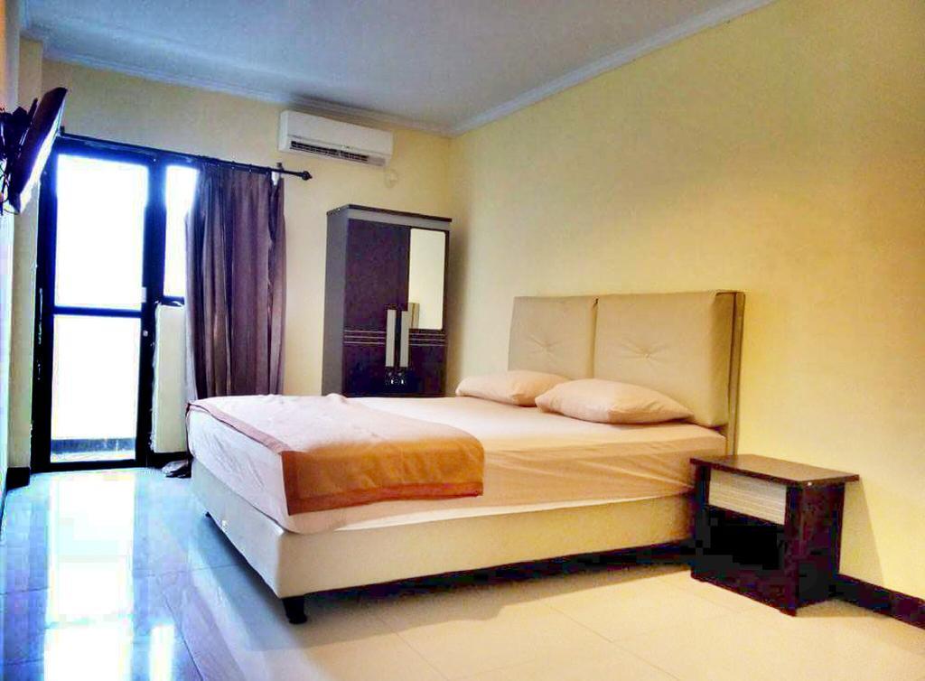 Quint Hotel Manado Buitenkant foto